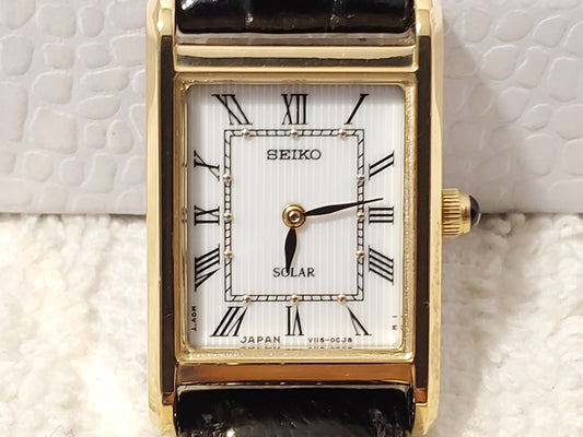 Vintage Seiko Solar Tank Women's Gold Tone Watch Leather Strap Roman Numerals