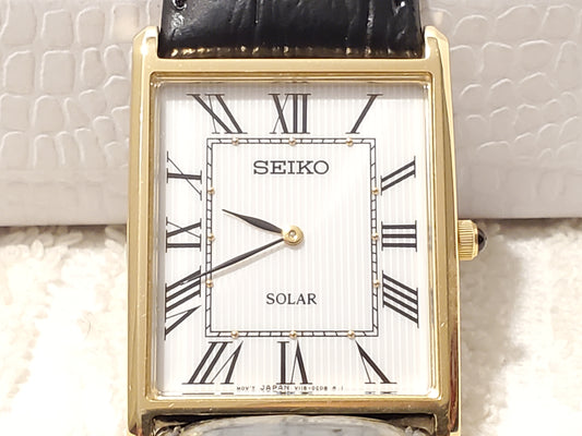 Vintage Seiko Solar Tank Men's Watch Roman Numerals White Dial Black Strap