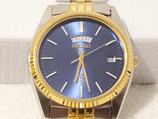 Vintage Seiko SQ Mens Day Date Watch Stainless Steel Gold Tone 1 Jewel Blue Dial