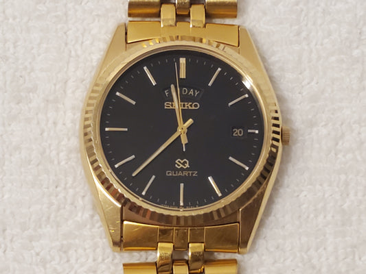 Vintage Seiko SQ Men Day Date Black Dial Watch 1 Jewel Gold Tone Stainless Steel